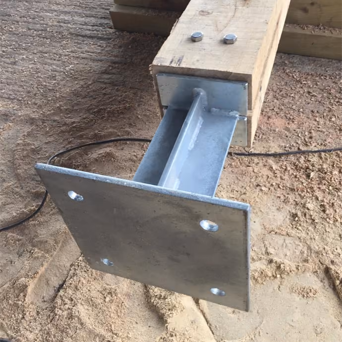 Steel footings for a timber-framed barn